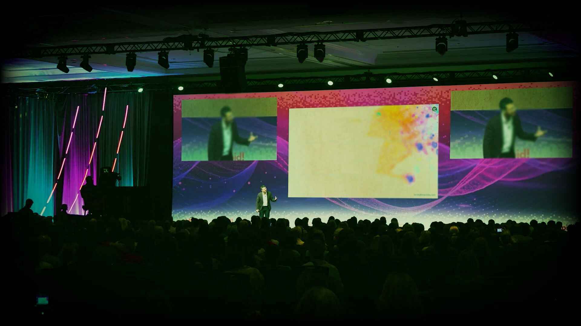 Speaker addressing a corporate audience illustrating how leadership and workplace culture are shaped by communication